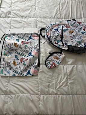 Nike Air Jordan White Multi-color Print Backpack His and Hers Set